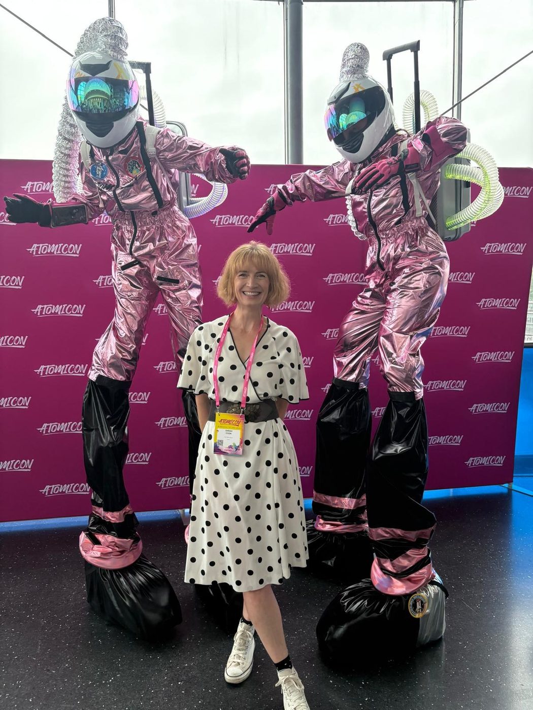 Sarah with stilt-walking astronauts at ATOMICON